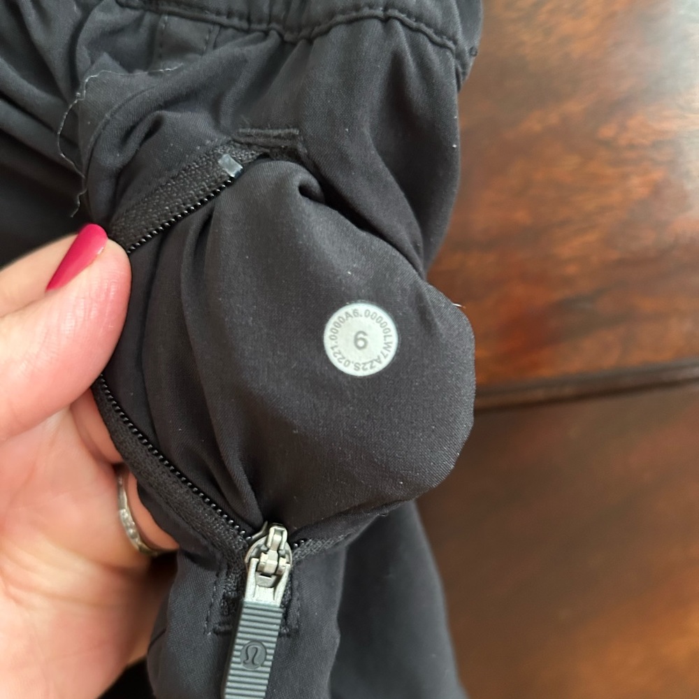 Lululemon size 6 with a  4” inseam black shorts with pockets
